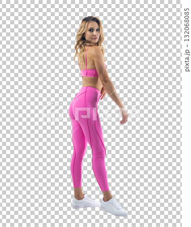 Athletic woman smiling, posing in pink fitness outfiton on transparent background 132068085