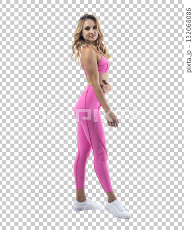 Athletic woman smiling, posing in pink fitness outfiton on transparent background 132068086