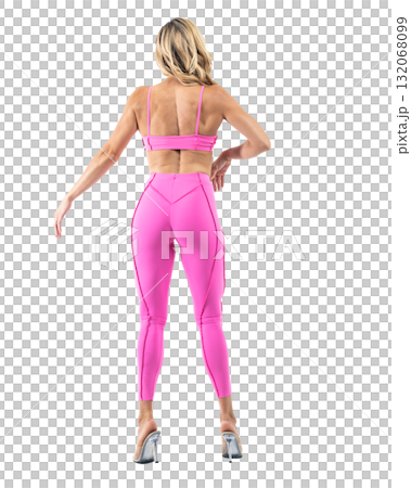 Athletic woman smiling, posing in pink fitness outfiton on transparent background Athletic woman smiling, posing in pink fitness outfiton on transparent background 132068099