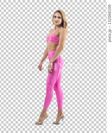 Athletic woman smiling, posing in pink fitness outfiton on transparent background Athletic woman smiling, posing in pink fitness outfiton on transparent background 132068100