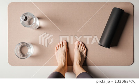 Post Workout Recovery Flat Lay with Bare Feet on Mat 132068476