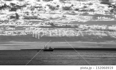 Ship in marine landscape at evening, Patagonia, Argentina. 132068919