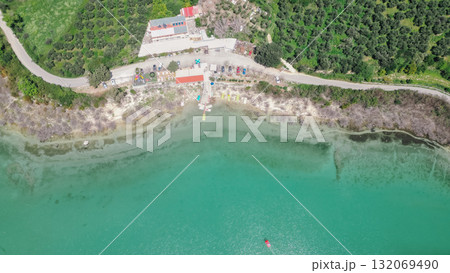 Lake Kournas in Crete aerial view of pedal boat rental clear water and scenic Greek nature. 132069490