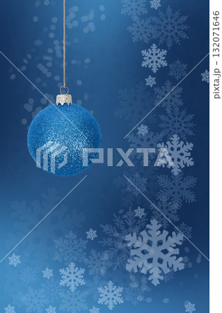 Christmas tree bauble on blue background with white snowflakes. Festive winter holiday background. Design with copy space for greeting card, text, advertising, banner, invitation Christmas tree bauble on blue background with white snowflakes. Festive winter holiday background. Design with copy space for greeting card, text, advertising, banner, invitation 132071646