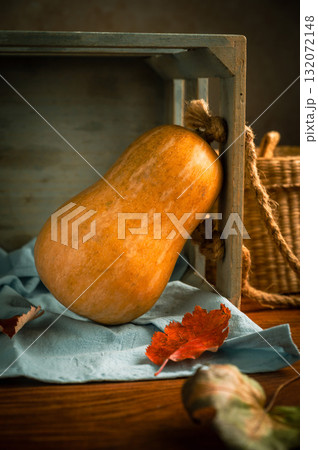 Orange squash, rustic wooden moody background, autumn concept 132072148