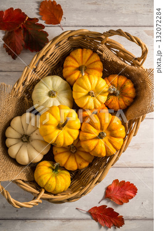 Autumn pumpkins and leaves. Thanksgiving day or Halloween. Flat lay autumn background Autumn pumpkins and leaves. Thanksgiving day or Halloween. Flat lay autumn background 132072284