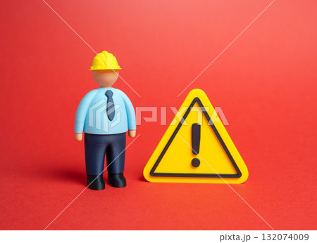 Construction worker and hazard warning sign. Safety precautions. Construction and repair, critical building structural defects. Industrial problems. Inspection, prevention of accidents 132074009