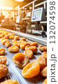 Production line with dried apricots in food manufacturing plant 132074598