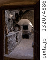Dark stone kitchen, old style. 132074886
