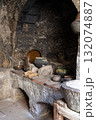 Dark stone kitchen, old style. 132074887
