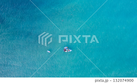 Fishing boat on the turquoise sea Fishing boat on the turquoise sea 132074900