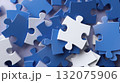 Blue and white puzzle pieces close-up in 3D abstract background 132075906