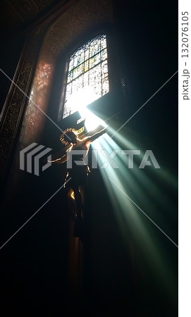 Man is depicted in a window with sunlight shining on him Man is depicted in a window with sunlight shining on him 132076105