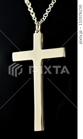 Gold cross necklace with a silver chain 132076230