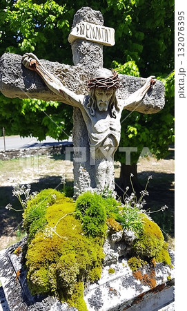 Cross with a statue of Jesus Christ on top of it Cross with a statue of Jesus Christ on top of it 132076395