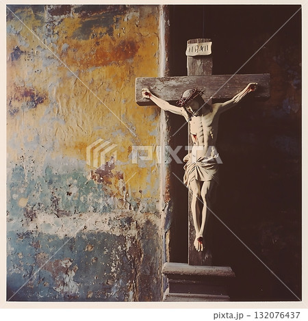 Wooden cross with a man on top of it Wooden cross with a man on top of it 132076437