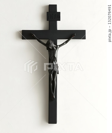 Black cross with a man in the middle of it Black cross with a man in the middle of it 132076491