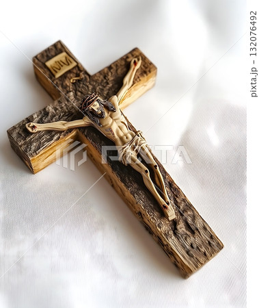 Wooden cross with a man on it, Jesus Christ 132076492