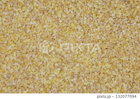 A close-up view bulgur. The textured abstract background 132077094