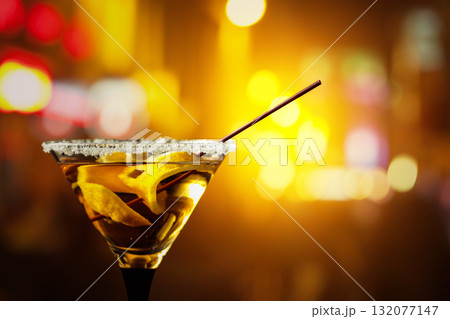Glass of Martini with lemon slice. Glass of Martini with lemon slice. 132077147