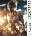 Determined and Sweaty Athletic Woman Engaged in Intense Weight Training with Dumbbells in a Dark, Atmospheric Gym Lit by Golden Light 132078759