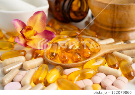 Alternative medicine herbal organic capsule with vitamin E omega 3 fish oil, mineral, drug with herbs leaf natural supplements for healthy good life. 132079860