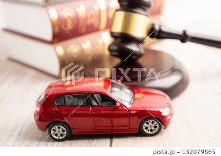Bangkok, Thailand March 15, 2024 Car accident lawsuit and insurance, Judge hammer and money with car model. Bangkok, Thailand March 15, 2024 Car accident lawsuit and insurance, Judge hammer and money with car model. 132079865