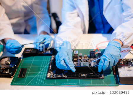 Electronics assembly and RAM installation with high-tech components. Ideal for showcasing advanced technology 132080455