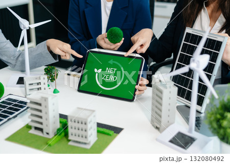business team people planning and discussing on recycle reduce reuse policy symbol in office meeting room. business team people planning and discussing on recycle reduce reuse policy symbol in office meeting room. 132080492