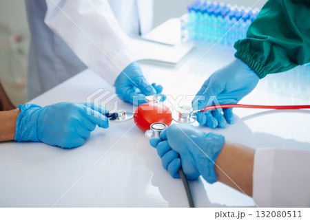Doctor handshake and partnership in healthcare, medicine or trust for collaboration, unity or support.Team of medical experts shaking hands Doctor handshake and partnership in healthcare, medicine or trust for collaboration, unity or support.Team of medical experts shaking hands 132080511