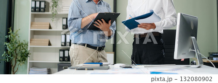 Portrait of success business people working together in modern office. 132080902