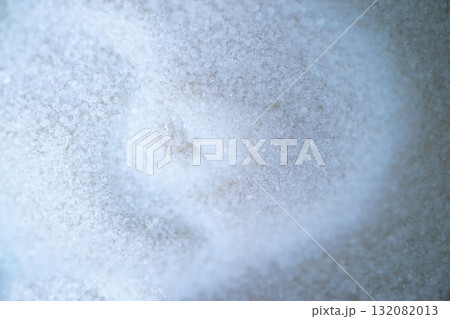 Grainy white texture with ripples, ideal for 3D representations and gastronomic backgrounds.Sal o azucar esparcidas. Grainy white texture with ripples, ideal for 3D representations and gastronomic backgrounds.Sal o azucar esparcidas. 132082013