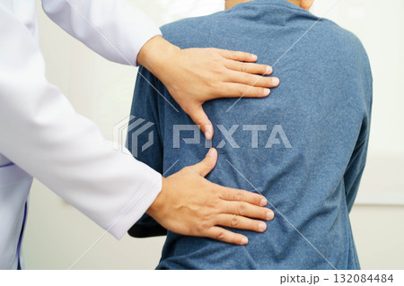 Physical therapy, Asian therapist doctor treat perform pain therapy in hospital. Physical therapy, Asian therapist doctor treat perform pain therapy in hospital. 132084484