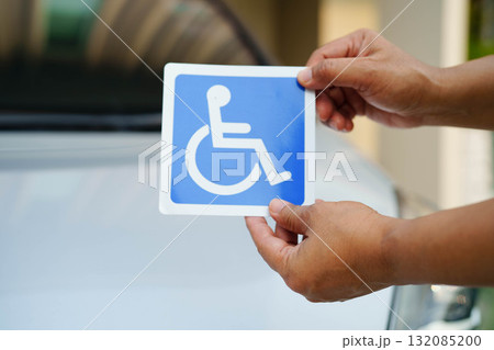 Wheelchair sticker sign on car for safety travel. Wheelchair sticker sign on car for safety travel. 132085200
