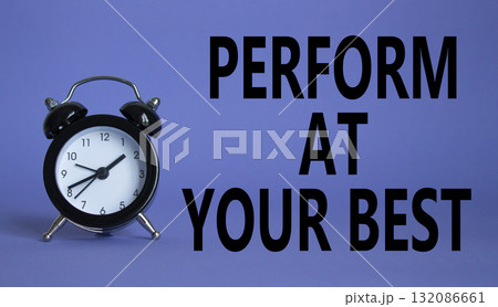 Perform at your best symbol. Beautiful purple background with alarm clock. Business and Perform at your best concept. Copy space. Perform at your best symbol. Beautiful purple background with alarm clock. Business and Perform at your best concept. Copy space. 132086661