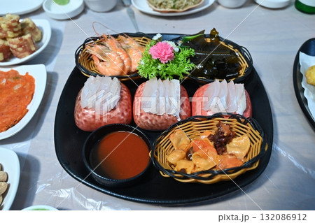 Korean style raw fish. Sashimi 132086912