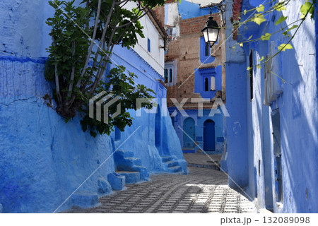 Chefchaouen, Morocco. Houses, streets and steps of old medina painted in blue Chefchaouen, Morocco. Houses, streets and steps of old medina painted in blue 132089098