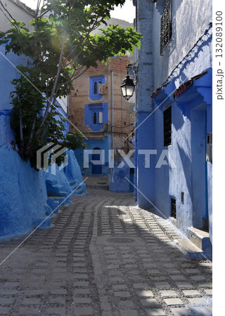 Chefchaouen, Morocco. Houses, streets and steps of old medina painted in blue Chefchaouen, Morocco. Houses, streets and steps of old medina painted in blue 132089100