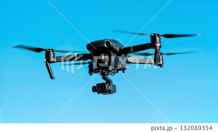 Military Drone Hovering Against Clear Blue Sky Aerial Technology 132089354