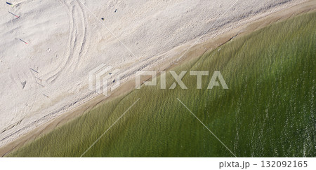 sandy beach on the seashore, view from above sandy beach on the seashore, view from above 132092165