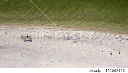 sandy beach on the seashore, view from above sandy beach on the seashore, view from above 132092166