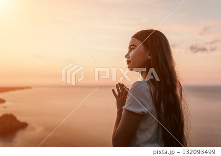 Young Woman Contemplating at Sunset Young Woman Contemplating at Sunset 132093499