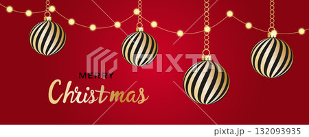 Red and white striped Christmas balls hang on red satin ribbon with bow. Red and white striped Christmas balls hang on red satin ribbon with bow. 132093935