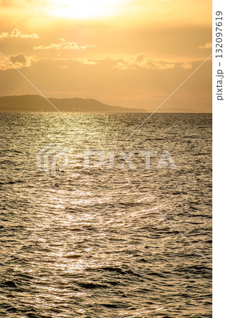 Golden Sunset Over Calm Sea Golden Sunset Over Calm Sea 132097619