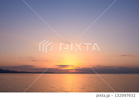 Serene Sunset Over Calm Ocean Serene Sunset Over Calm Ocean 132097632
