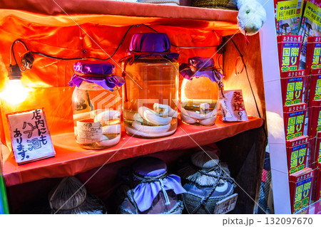 Okinawa snake wine, traditional Okinawan Habushu Habu Sake, made by infusing snake into Awamori rice liquor in Okinawa, Japan 132097670