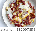 Scrambled Egg with fresh Red Bell Pepper on Plate for breakfast 132097858