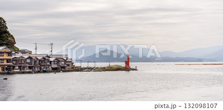 Traditional wooden fishermen Funaya boathouses in Ine, north Kyoto prefecture on the Sea of Japan Traditional wooden fishermen Funaya boathouses in Ine, north Kyoto prefecture on the Sea of Japan 132098107