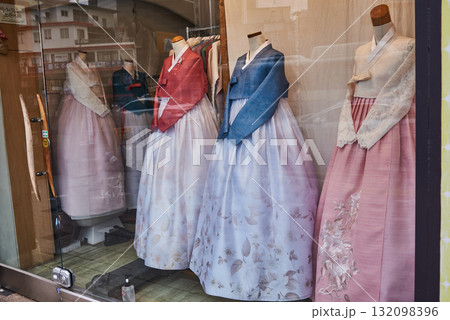 Mannequins in traditional Korean hanbok dresses displayed in a store window in Busan, South Korea 132098396