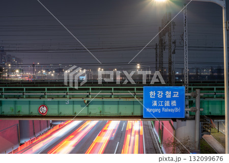 Night Traffic Under Railway Bridge in Seoul, South Korea 132099676